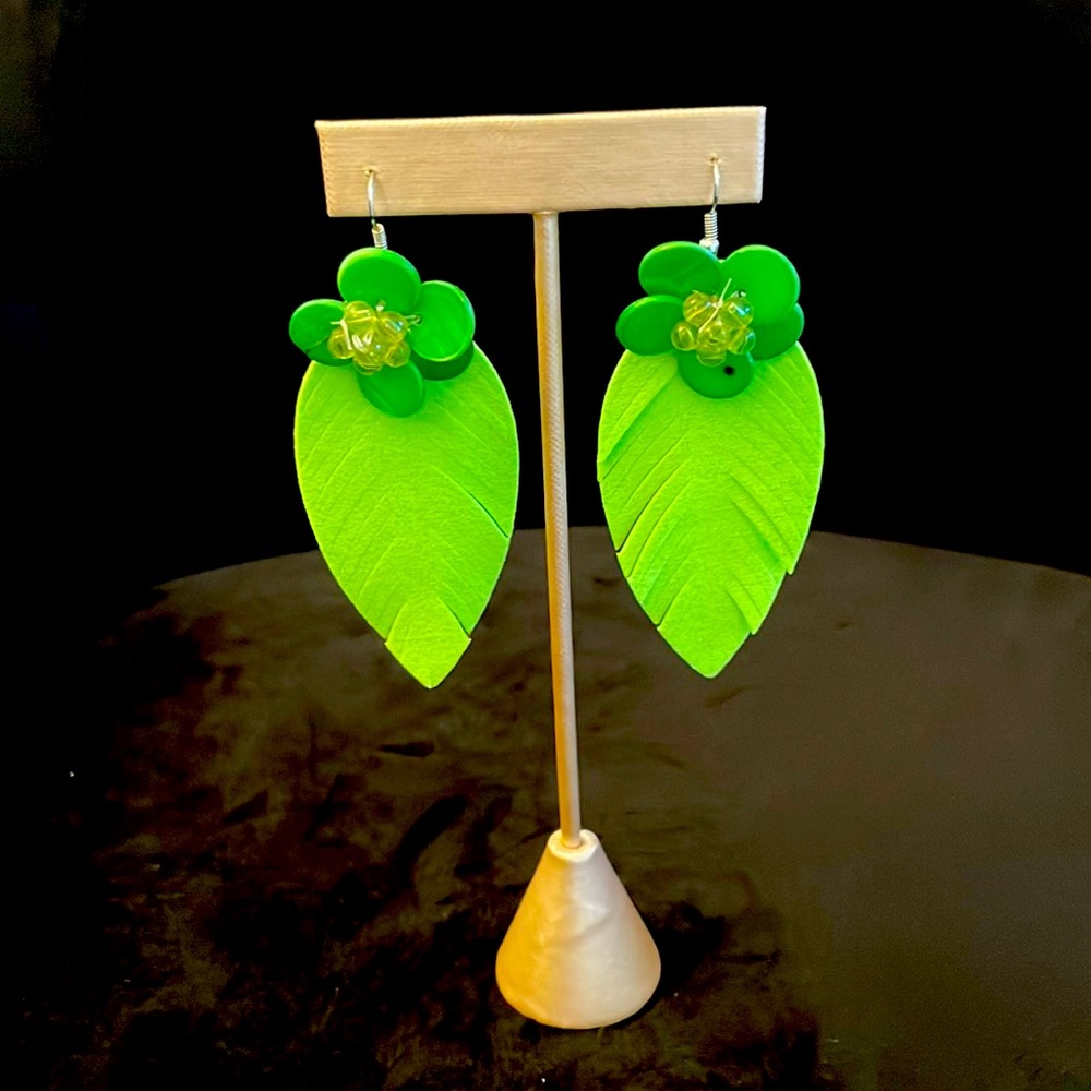 Brand new bright green flower and feather-like earrings; 3.5 inches long